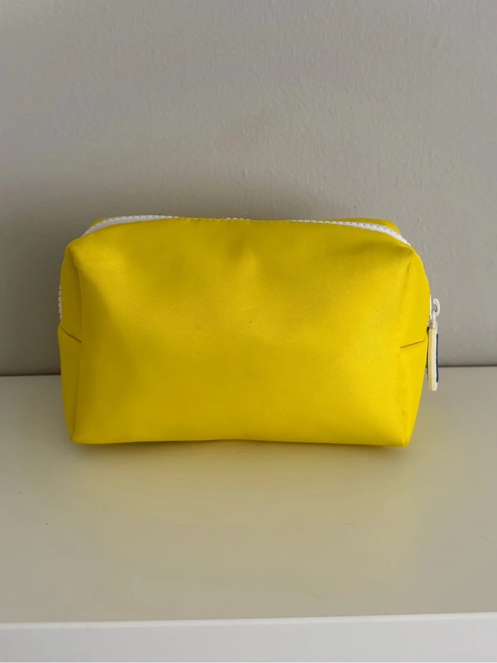 Supergoop Bright Yellow Zipper Pouch